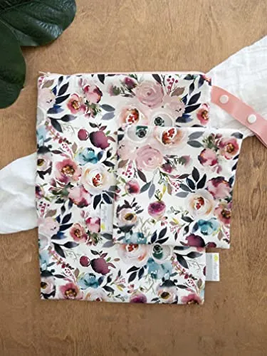 Itzy Ritzy Sealed Wet Bag with Adjustable Handle – Washable and Reusable Wet Bag with Water Resistant Lining Ideal for Swimwear, Diapers, Gym Clothes & Toiletries; Measures 11” x 14”, Blush Floral