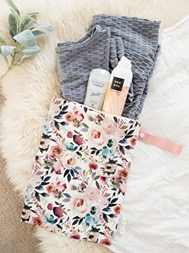 Itzy Ritzy Sealed Wet Bag with Adjustable Handle – Washable and Reusable Wet Bag with Water Resistant Lining Ideal for Swimwear, Diapers, Gym Clothes & Toiletries; Measures 11” x 14”, Blush Floral