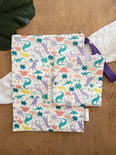 Itzy Ritzy Sealed Wet Bag with Adjustable Handle – Washable and Reusable Wet Bag with Water Resistant Lining Ideal for Swimwear, Diapers, Gym Clothes & Toiletries; Measures 11” x 14”, Darling Dinos